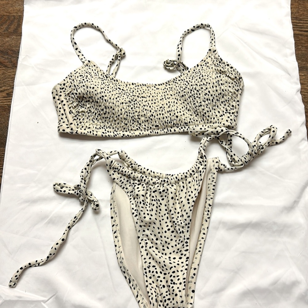 White and black polka dot target swimsuit, size M, worn once, too big